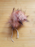 Pompons en fausse fourrure Flamant rose